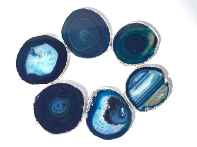 Set of six stylish coasters adding a touch of earthy decor to any living space. #LuxuryHome