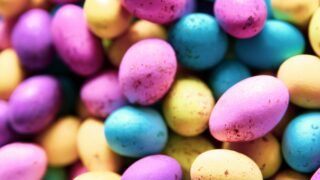 pink yellow and blue round candies