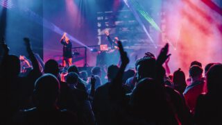 Female performer on stage with microphone