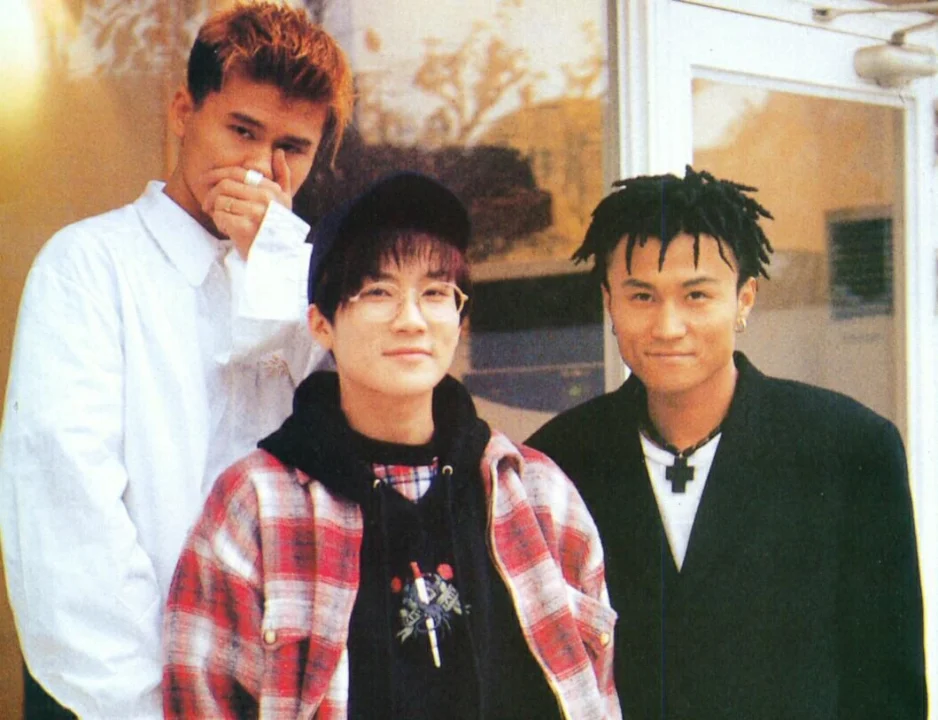 A vintage magazine-style photograph of the iconic 1990s K-pop trio, Seo Taiji and Boys